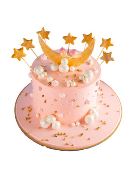 Baby on the moon cake with stars and clouds, perfect for baby shower or birthday.