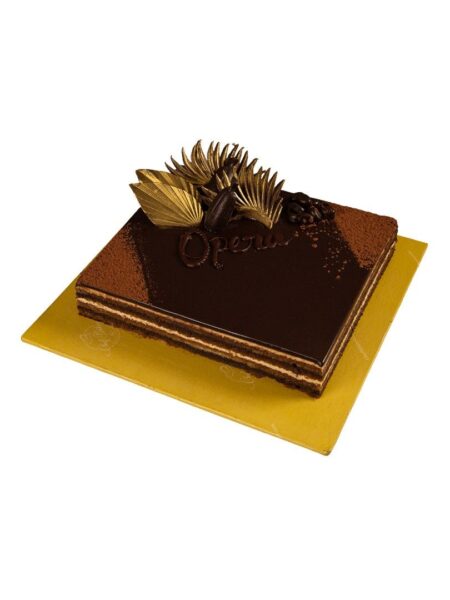 French Opera cake with almond sponge, coffee cream, and chocolate ganache layers