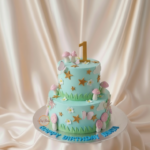 Whimsical Two-Tier Cake with Mushrooms, Stars, and Butterflies