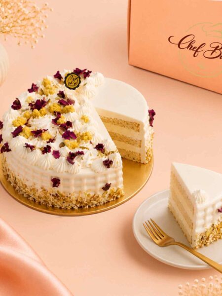 Kesar Rasmalai Cake with one slice
