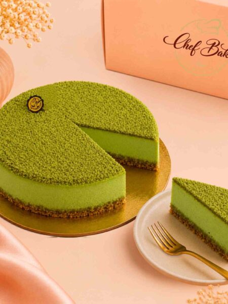 Matcha Baked Cheesecake with one slice